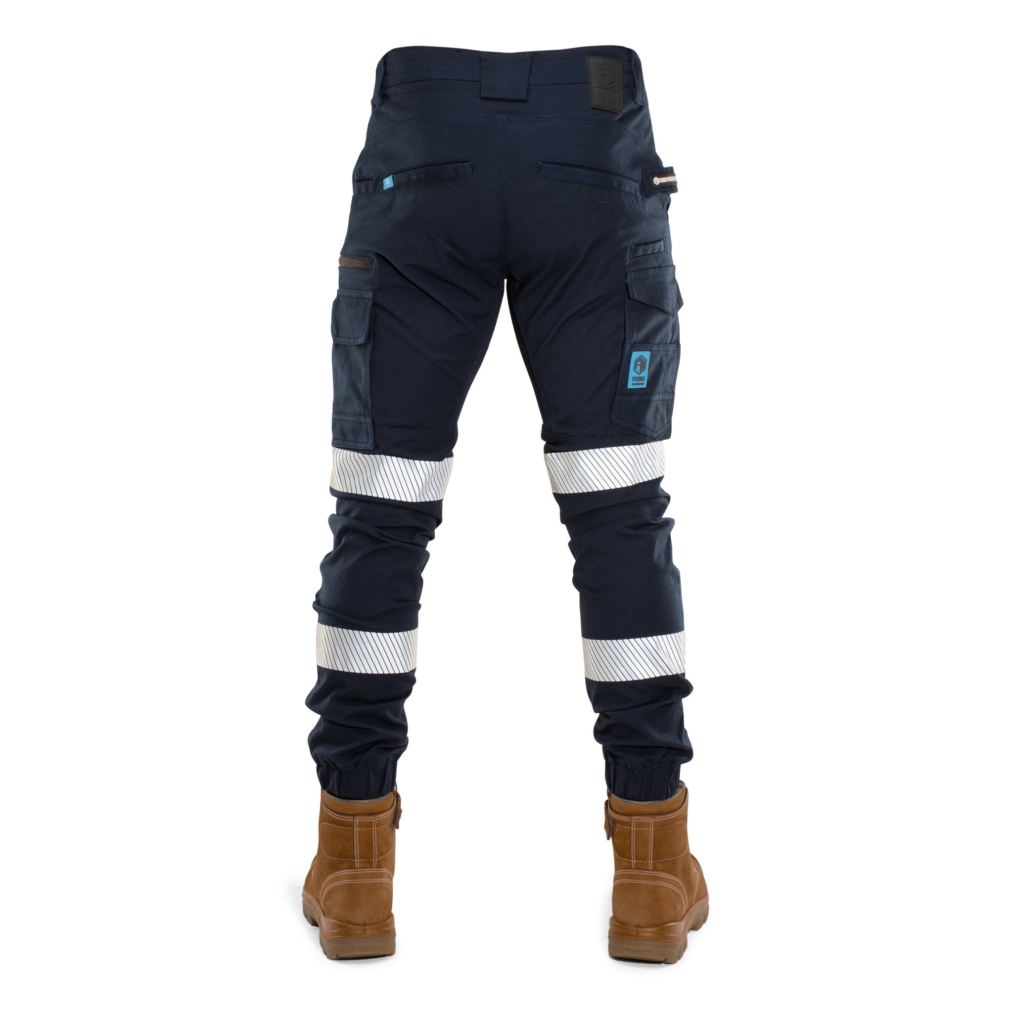 Back view of FB1 navy hi-vis cuffed work pants with reflective tape and utility pockets