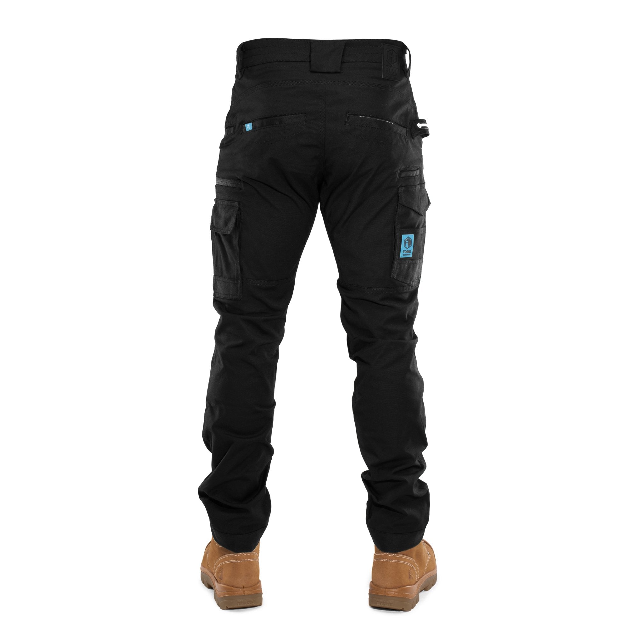 Back view of FB2 black stretch work pants with cargo pockets and cuffed ankles