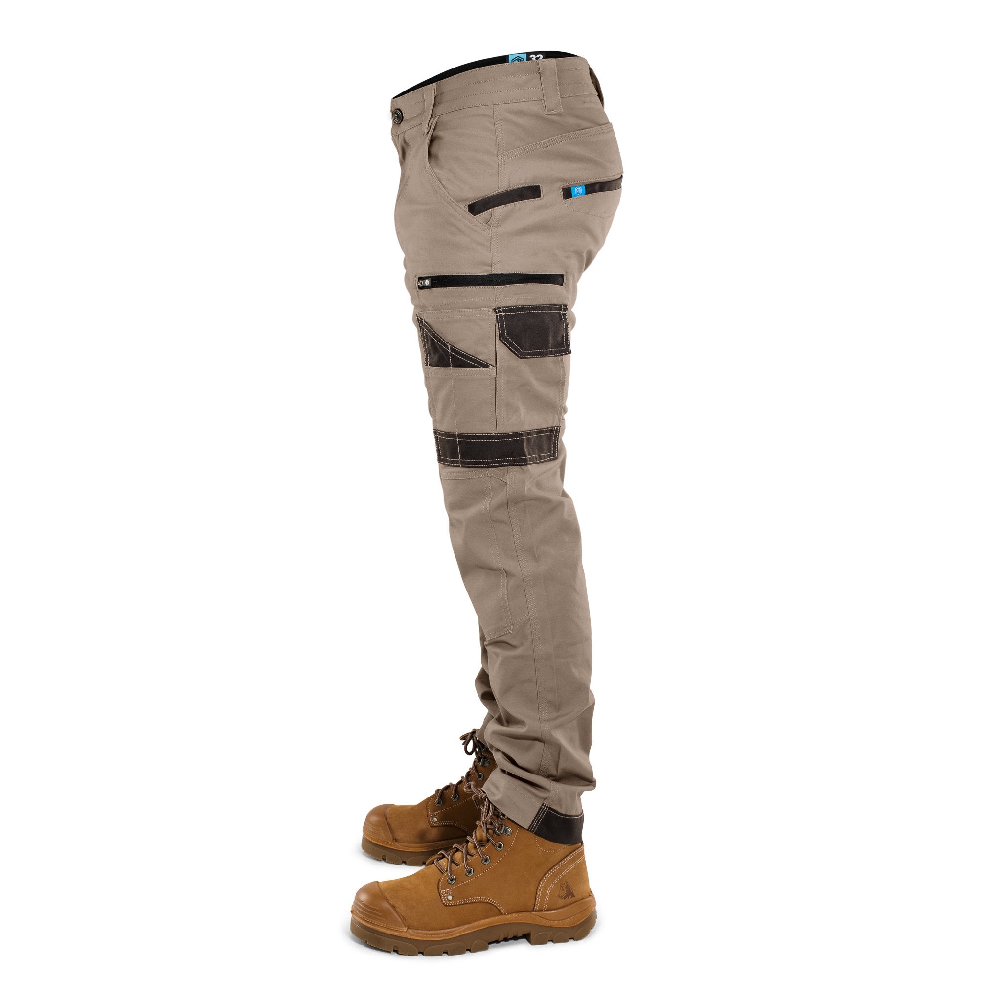 Left side view of FB2 khaki work pants showing multi-pocket design and reinforced panels