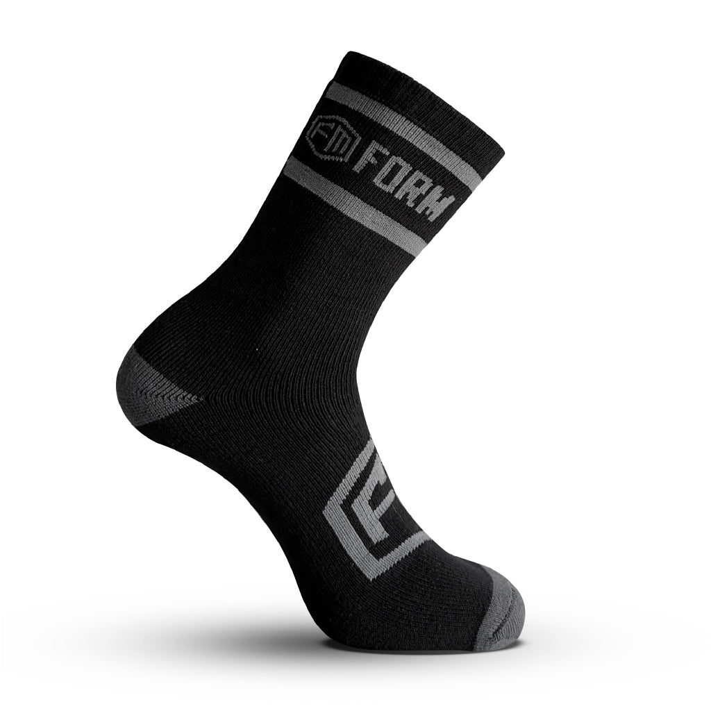 Form Workwear black socks front view with logo, designed for durability and comfort