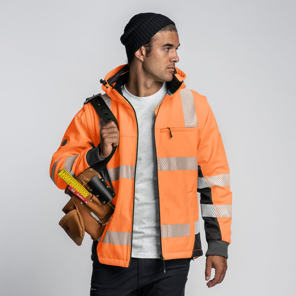 Tradesman wearing Form Workwear FT6 hi-vis orange jacket holding a tool belt