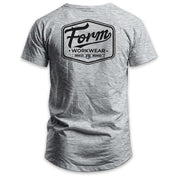 Back view of grey Form Workwear t-shirt featuring large black logo and branding slogan 'Unrivalled, Undeniable
