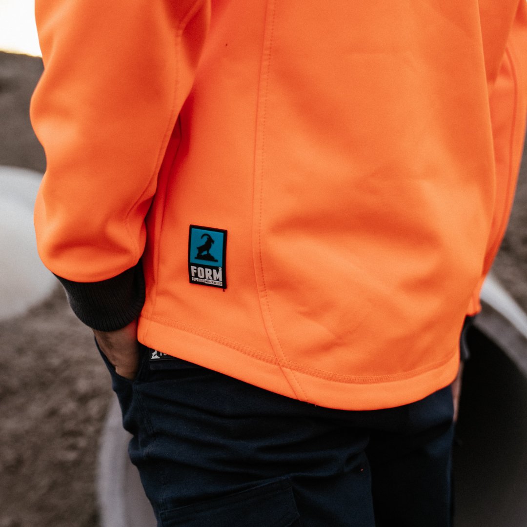 Detail shot of the Form Workwear logo on the back of a hi-vis jacket