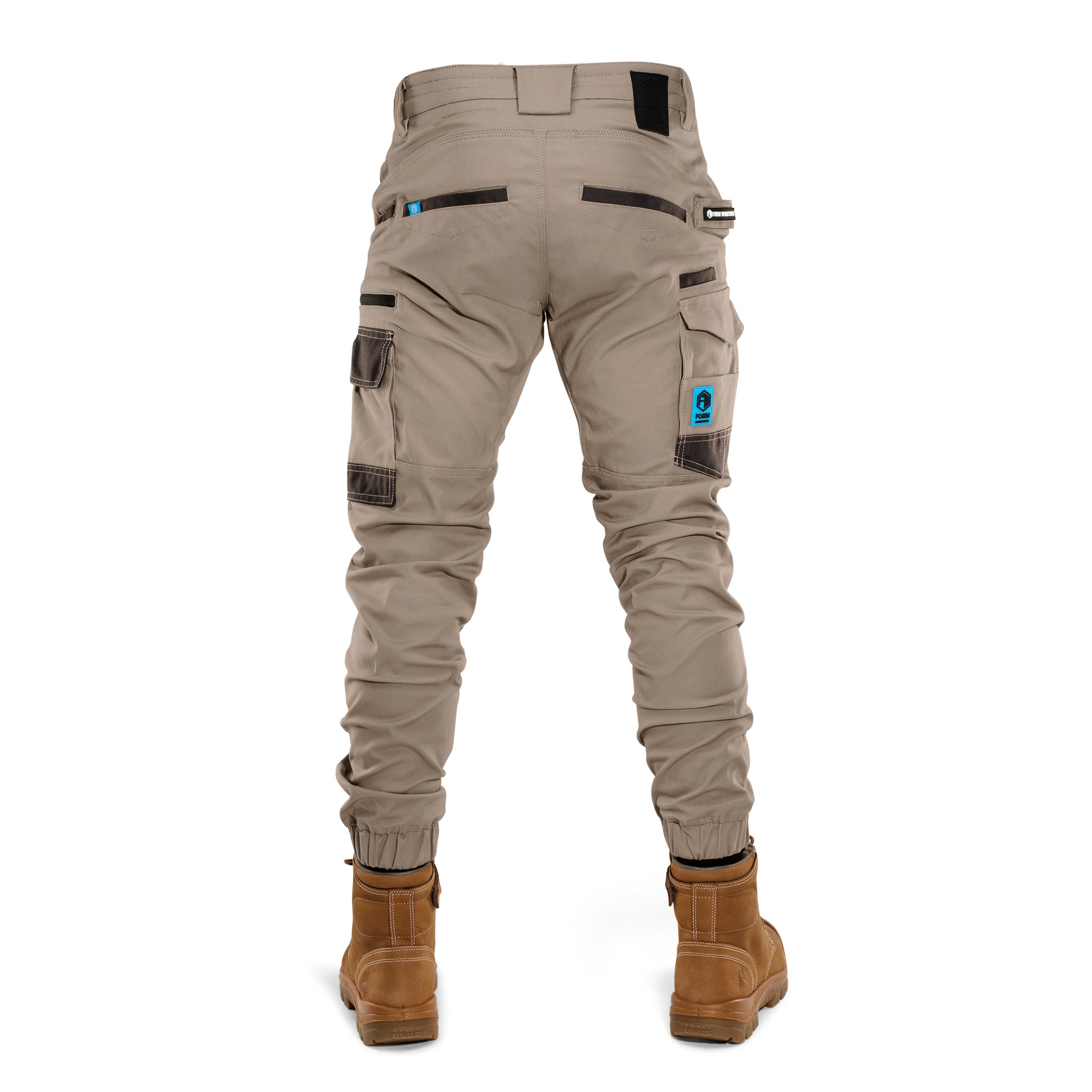 Back view of Form Workwear khaki cargo pants featuring multiple storage pockets and elastic cuffs