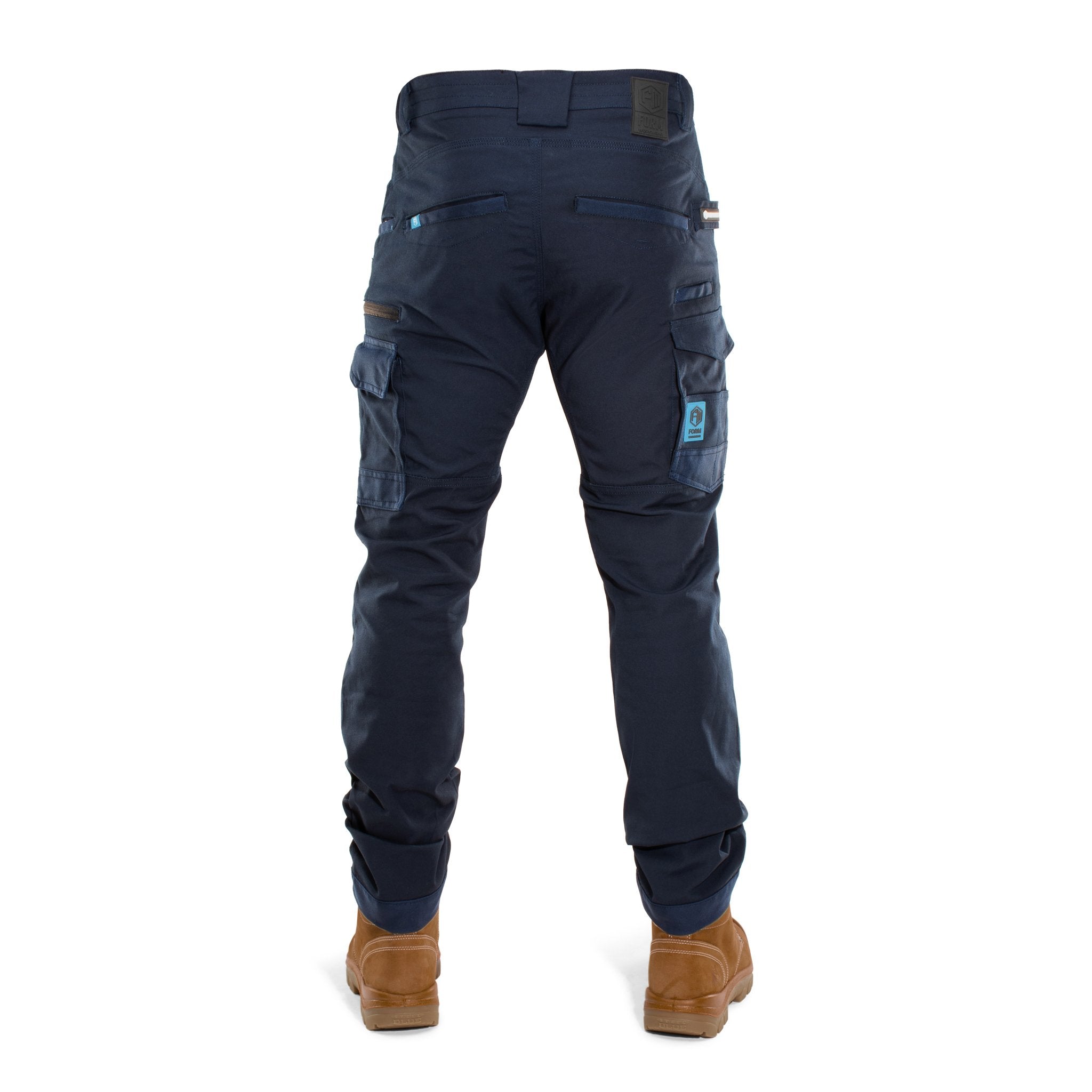 Rear view of Form Workwear navy work pants featuring reinforced pockets and stretch fit design