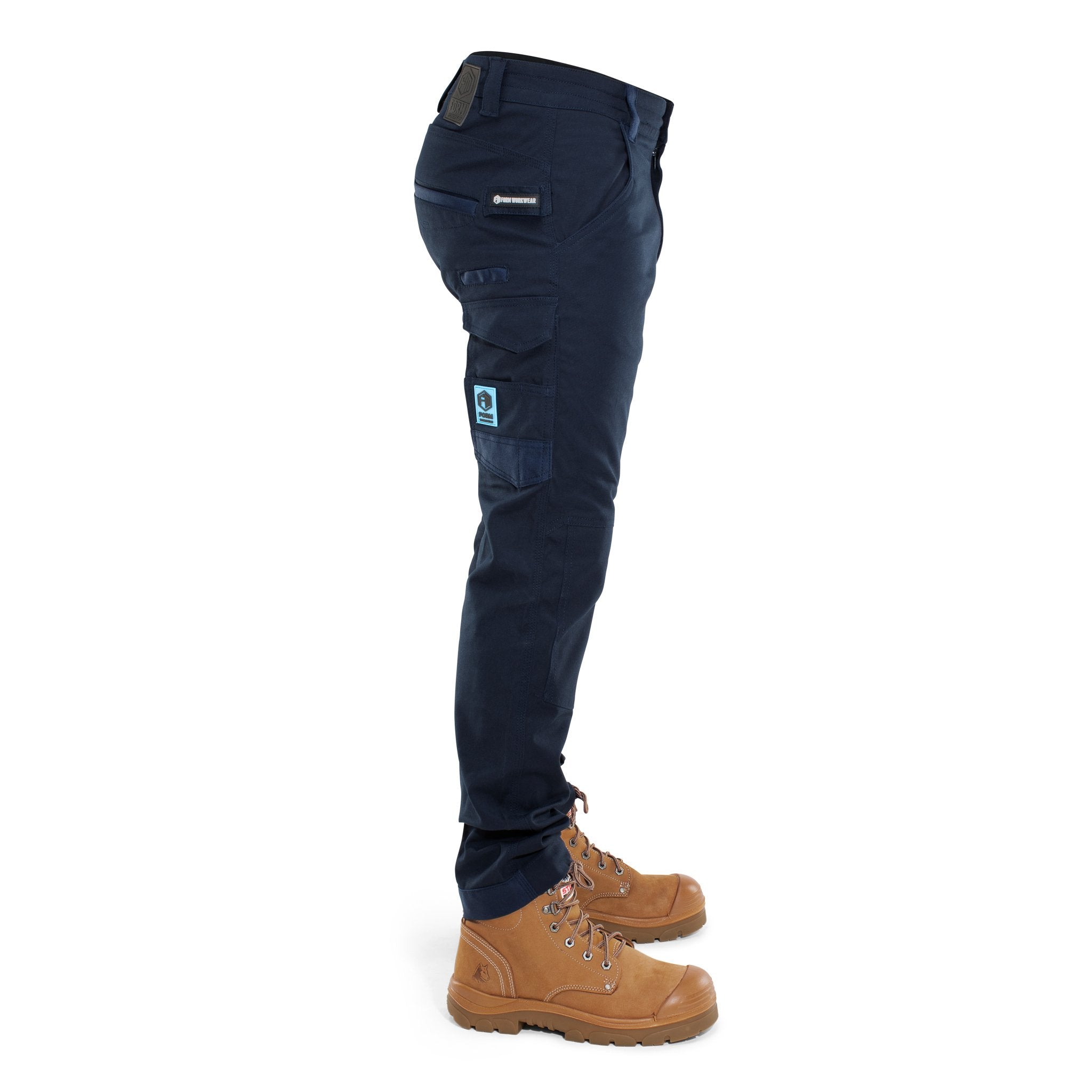 Side view of Form Workwear navy work pants showing multi-functional pockets and logo detailing